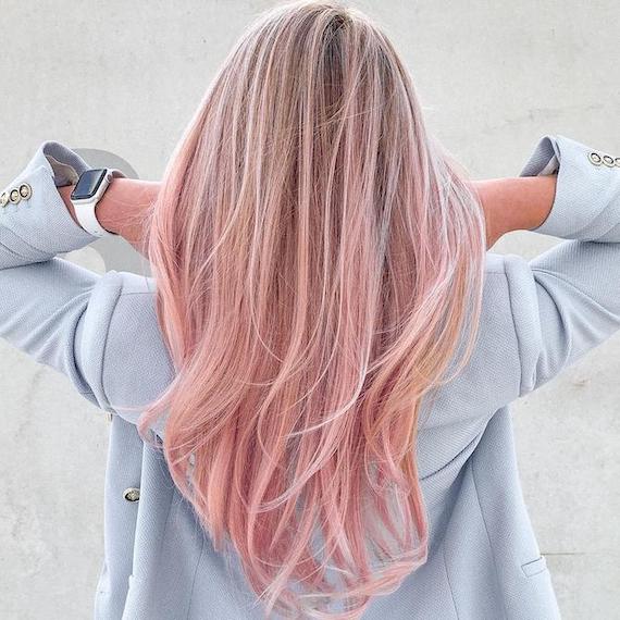 Soft ombre hair with subtle transition between shades, creating a natural blended look by Schwarzkopf.