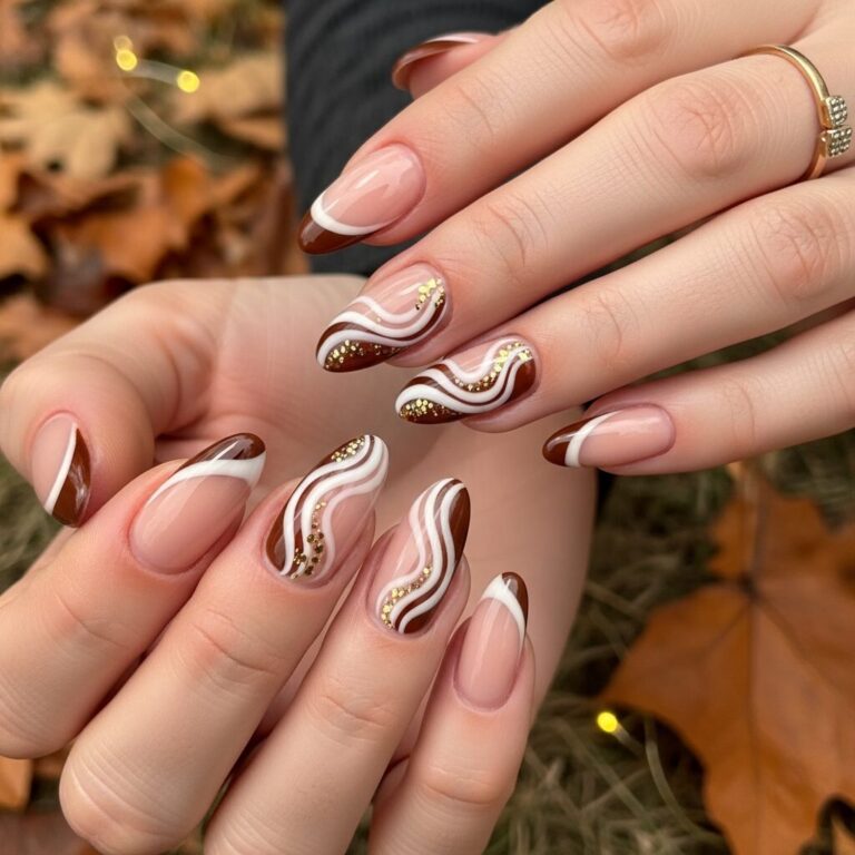 Close-up of Brown and White Swirl French Nails with Glossy Finish