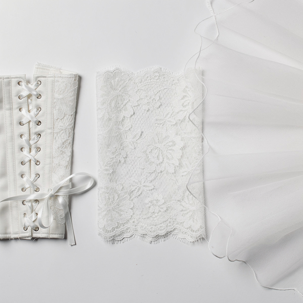 Caterina lace and corset lacing details for a tulle wedding dress