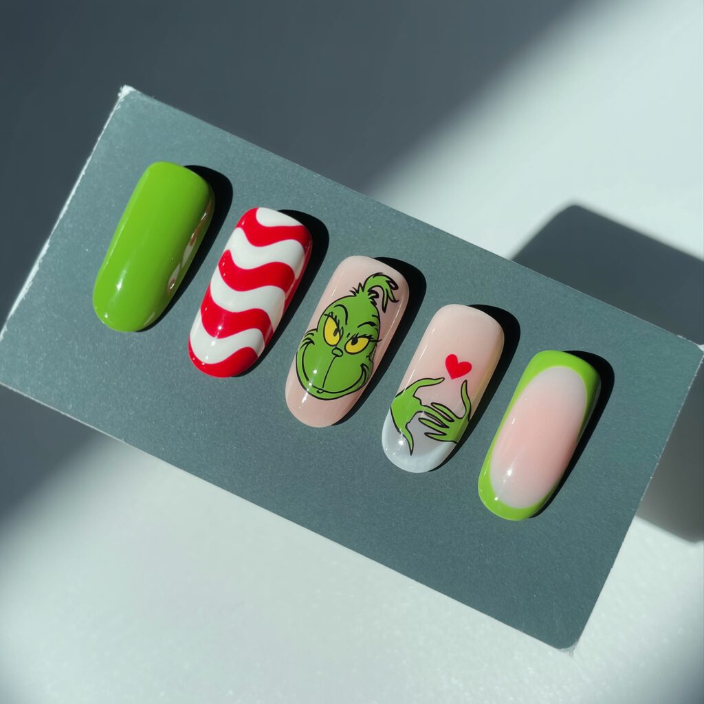 Five nail designs showing Grinch Christmas Nails styles including green polish and a Grinch accent.
