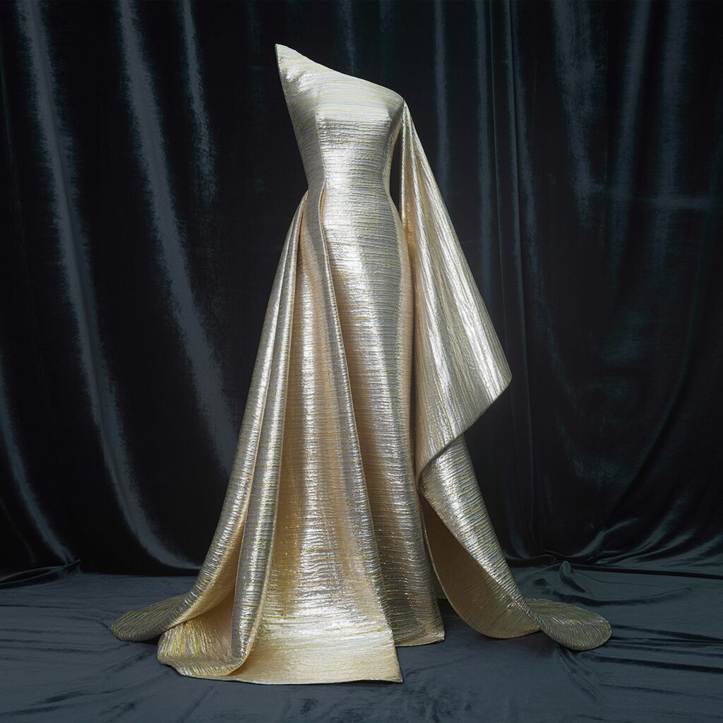 1920s metallic evening dress in gold and silver lame fabric, creating a show-stopping glamorous look