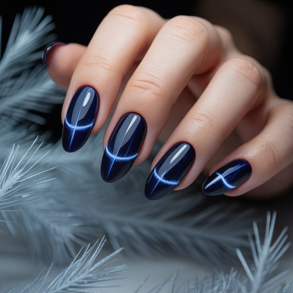 Dark blue cat eye nails with glowing magnetic line, winter night aesthetic, glossy finish