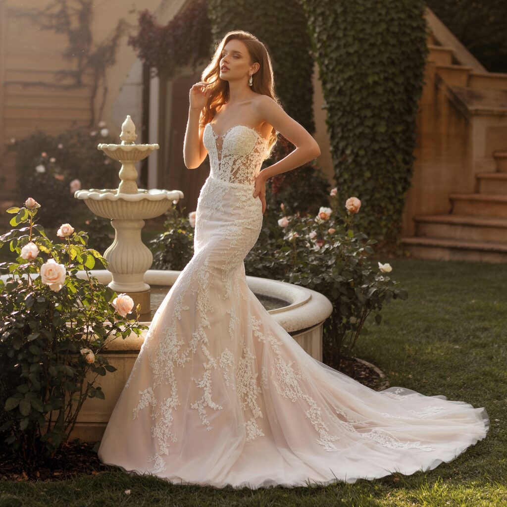 Elegant lace mermaid wedding dress with full length fitted silhouette
