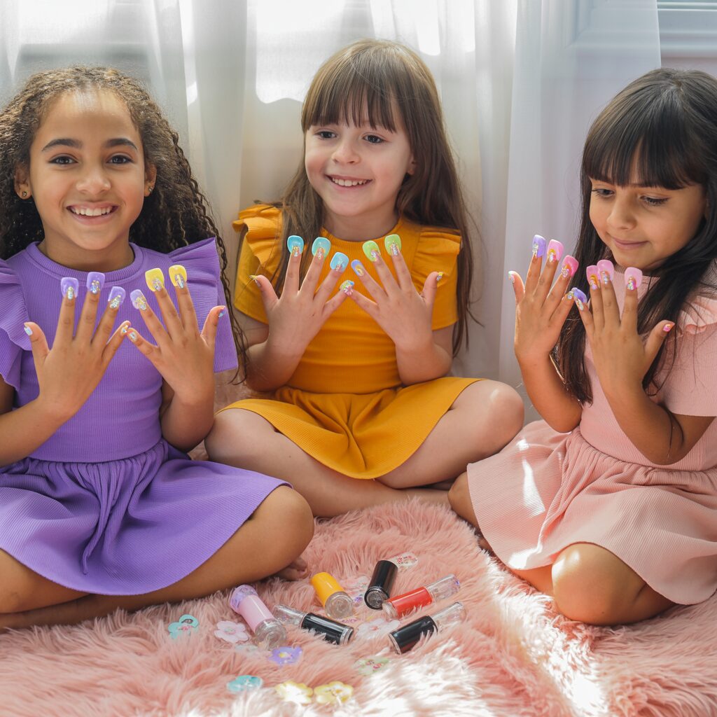 Safe and easy-to-use Olive and June press-on nails for children, designed for creative play